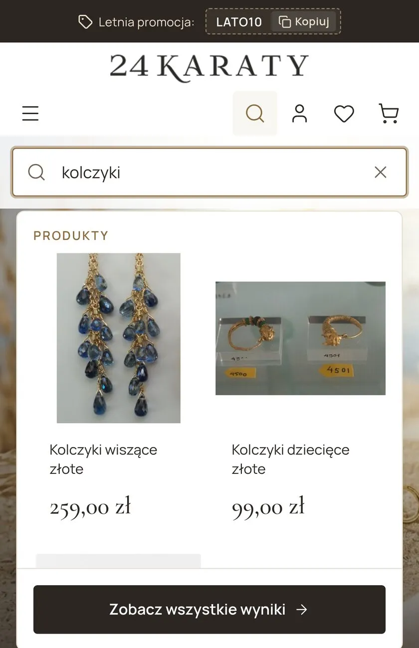 Ten sam sklep na telefonie: otwarte pole wyszukiwania z wpisaną frazą i panel podpowiedzi z kartami produktów.